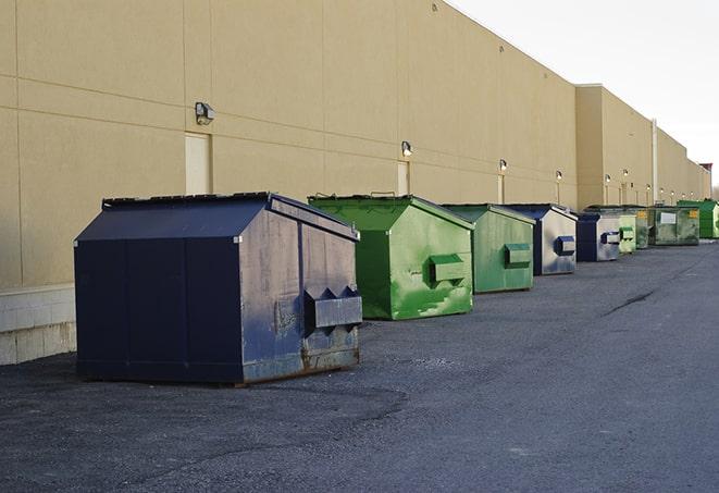 red and green waste bins at a building project in Highland